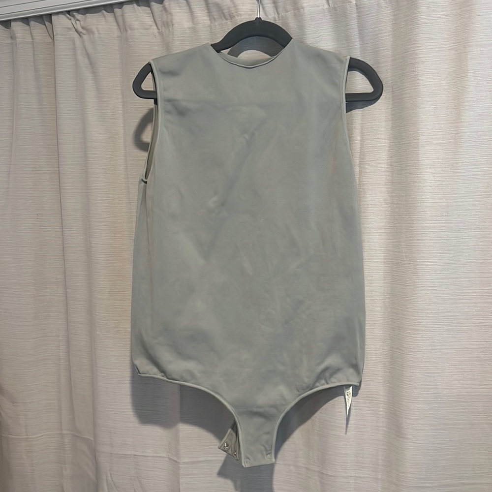 Skims body suit in Agave
